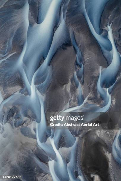 volcanic land and a braided river seen from directly above, iceland - braided river stock pictures, royalty-free photos & images