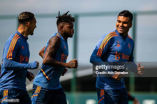 Antony, Fred, Casemiro of Manchester United in action during a first team training session at Carrington Training Ground on September 02, 2022 in...