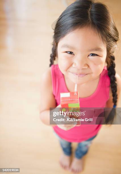 korean girl drinking juice box - juice box stock pictures, royalty-free photos & images