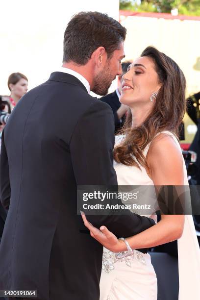 Ignazio Moser and Cecilia Rodriguez attend the "Bones And All" red carpet at the 79th Venice International Film Festival on September 02, 2022 in...