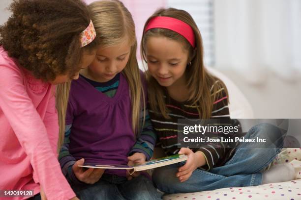 Sharing Books 2,933 Children Sharing Books Stock Photos, High-Res Pictures, and ...