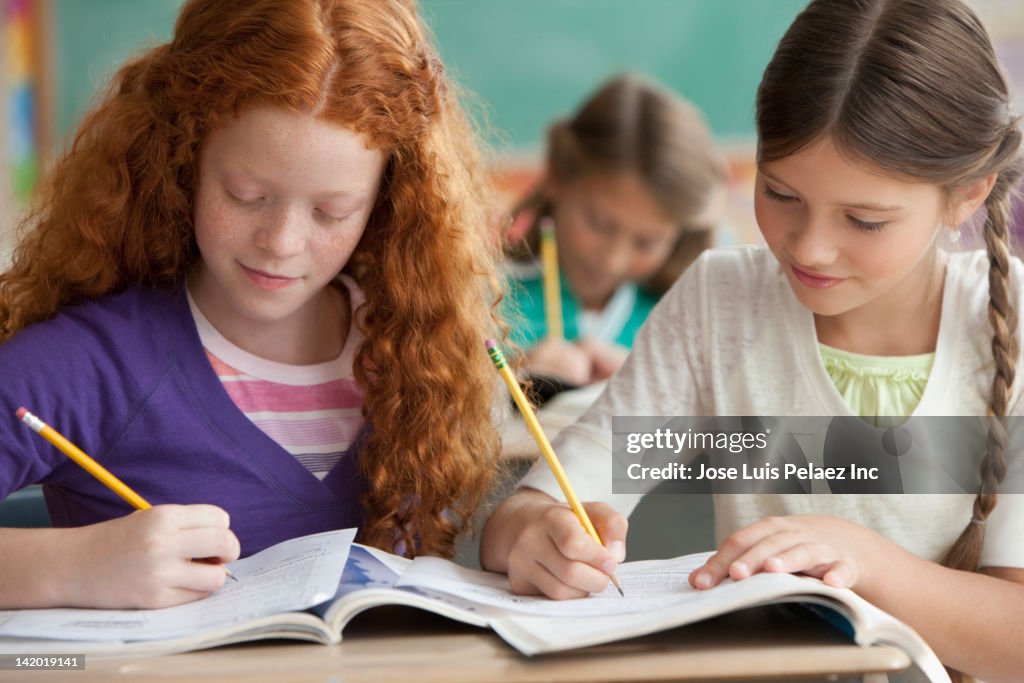Learning School Work Students Doing School Work In Classroom High-Res Stock Photo - Getty Images