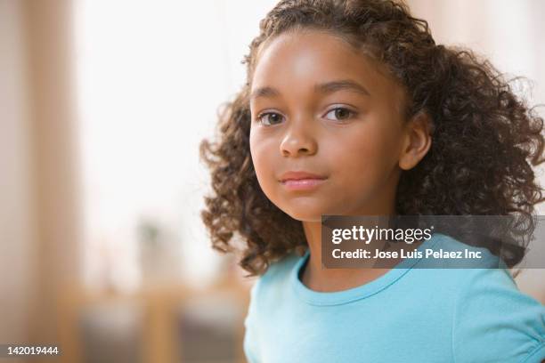 serious mixed race girl - serious child stock pictures, royalty-free photos & images