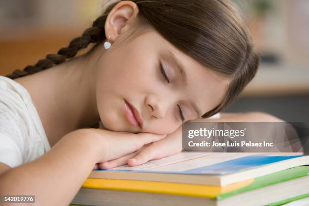 caucasian student sleeping in classroom - girl nap book stock pictures, royalty-free photos & images
