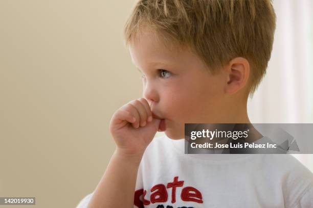 caucasian boy sucking his thumb - thumb sucking stock pictures, royalty-free photos & images