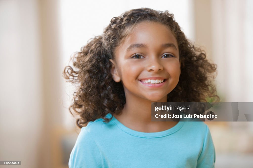 Smiling mixed race girl