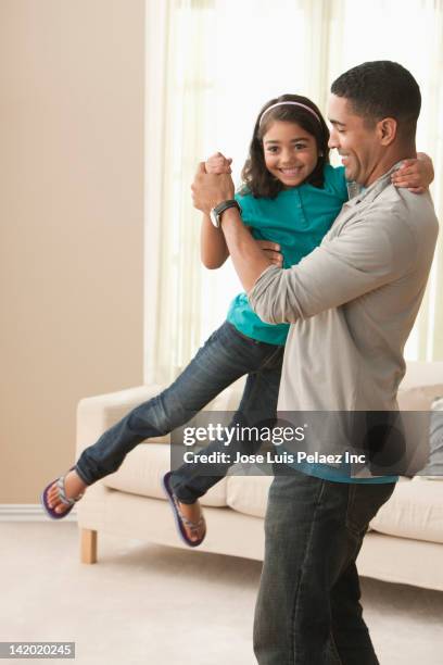 father dancing with daughter - family 2010 stock pictures, royalty-free photos & images