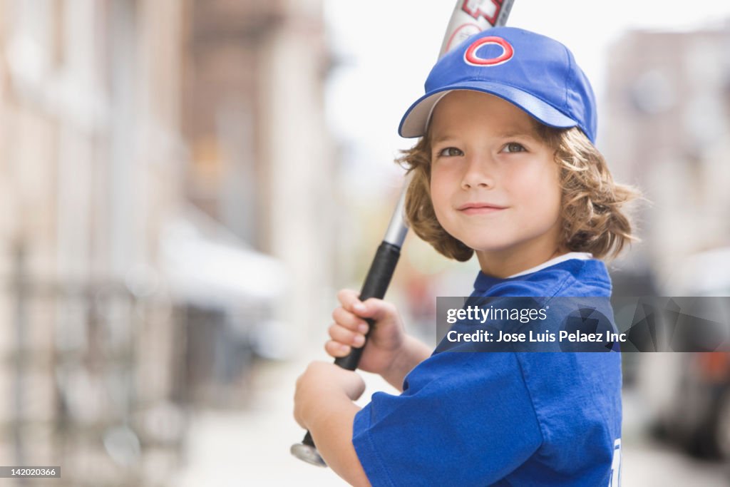 Caucasian boy in baseball uniform