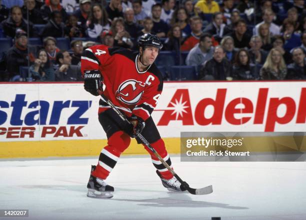 Defenseman Scott Stevens of the New Jersey Devils passes the puck during the NHL game against the Buffalo Sabres at the HSBC Arena in Buffalo, New...