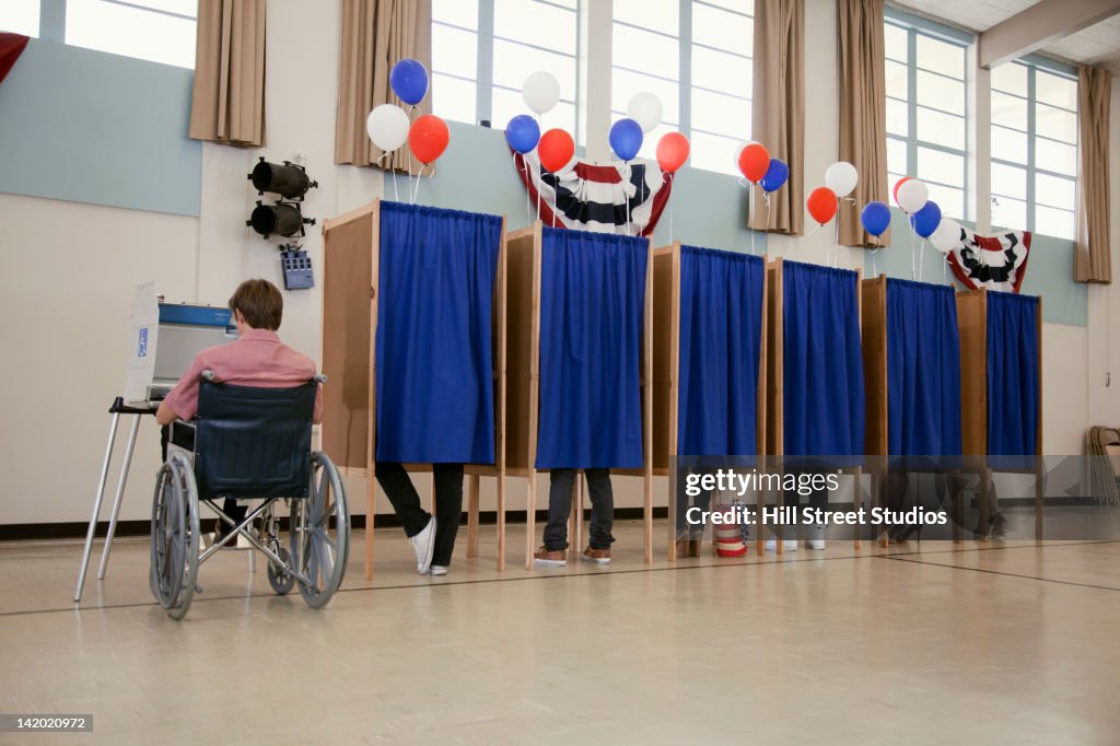 People voting in polling place