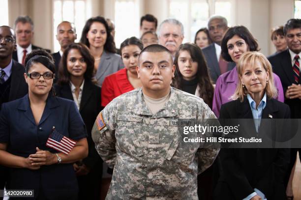 supporters waving american flags at political gathering - united states marine corps uniform fotografías e imágenes de stock