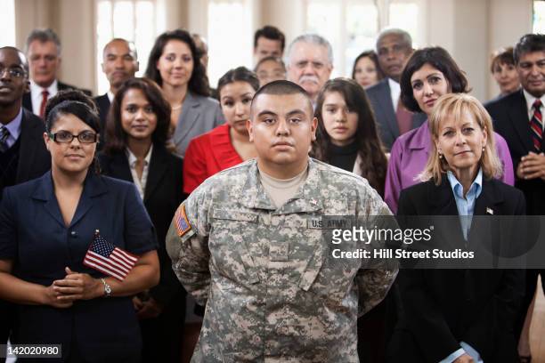 supporters waving american flags at political gathering - us marine corps stock pictures, royalty-free photos & images