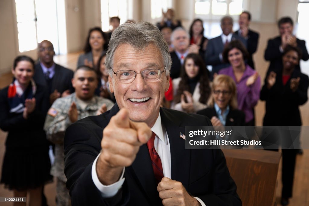 Supporters clapping for politician