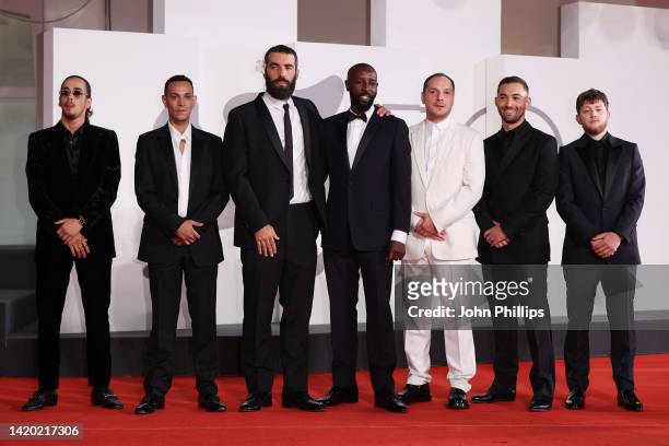 Sami Slimane, Ouassini Embarek, Director Romain Gavras, Ladj Ly, Alexis Manenti, Dali Benssalah and Anthony Bajon attend the "Athena" red carpet at...