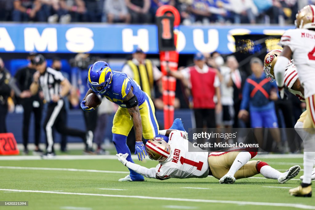 Nfc Rams Cam Akers of the Los Angeles Rams is tackled by Jimmie Ward of the ...