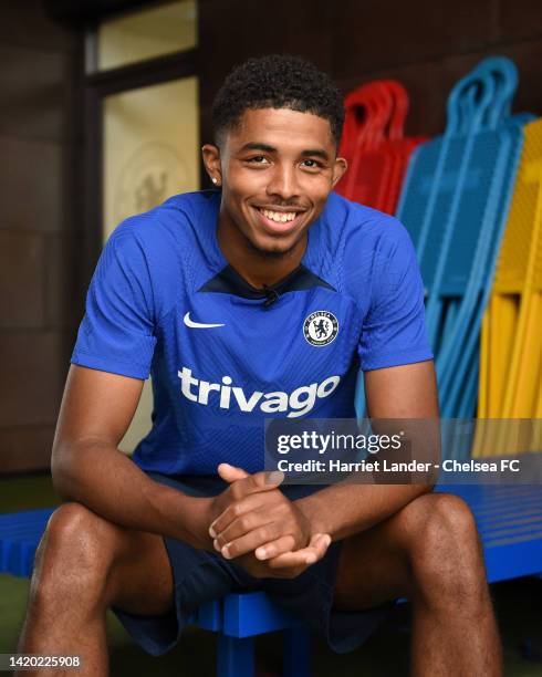 Wesley Fofana of Chelsea poses for a photograph as he signs for Chelsea at Chelsea Training Ground on August 31, 2022 in Cobham, England.