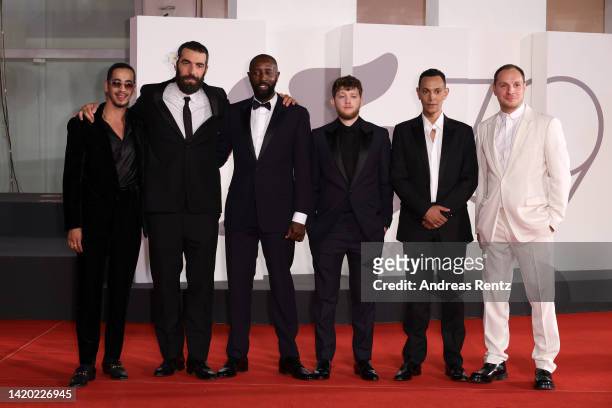 Sami Slimane, Director Romain Gavras, Ladj Ly, Alexis Manenti, Ouassini Embarek and Anthony Bajon attend the Netflix film "Athena" red carpet at the...