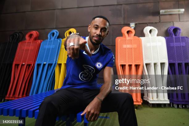 Pierre-Emerick Aubameyang poses for a photograph as he signs for Chelsea at Chelsea Training Ground on September 01, 2022 in Cobham, England.