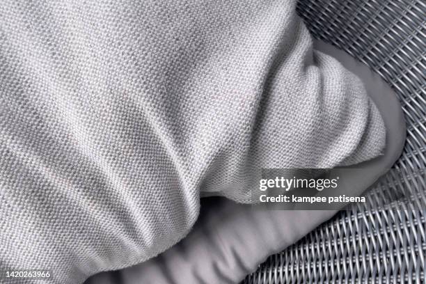 gray pillows rattan chair - cushion stock photos et images de collection