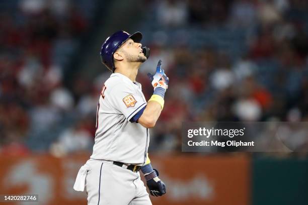 Yuli Gurriel of the Houston Astros reacts to a double in the fourth inning against the Los Angeles Angels at Angel Stadium of Anaheim on September...