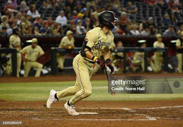 Jake McCarthy of the Arizona Diamondbacks hits an RBI single against the Milwaukee Brewers during the fifth inning at Chase Field on September 02,...
