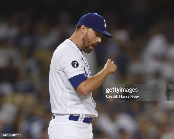 Heath Hembree of the Los Angeles Dodgers reacts to a three run homerun from Jurickson Profar of the San Diego Padres, to trail 7-0, during the sixth...