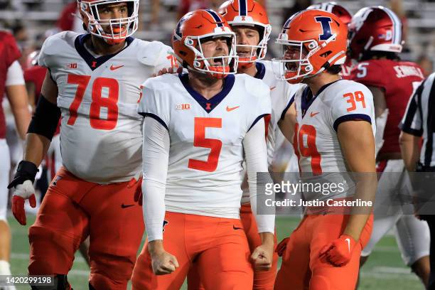 Caleb Griffin of the Illinois Fighting Illini celebrates a field goal in the fourth quarter during the game against the Indiana Hoosiers at Memorial...