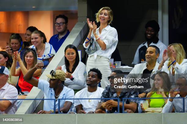 Heidi Gardner, Immanuel Quickley, and Obi Toppin attend the 2022 US Open at USTA Billie Jean King National Tennis Center on September 2, 2022 in the...