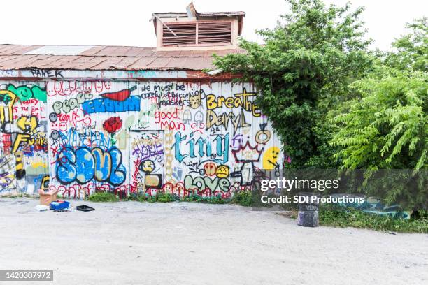 community center building - cleaning graffiti stock pictures, royalty-free photos & images