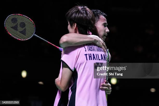 Dechapol Puavaranukroh and Sapsiree Taerattanachai of Thailand celebrate the victory in the Mixed Doubles Semi Finals match against Wang Yilyu and...