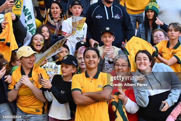 Sam Kerr of Australia poses for a photo with fans after the International Women's Friendly match between the Australia Matildas and Canada at Suncorp...