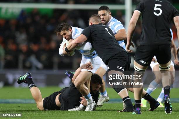 Juan Cruz Mallia of Argentina is tackled during The Rugby Championship match between the New Zealand All Blacks and Argentina Pumas at FMG Stadium...