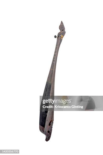 kulcapi - traditional stringed musical instruments from the karo tribe - north sumatra on a white background - string instruments stock pictures, royalty-free photos & images