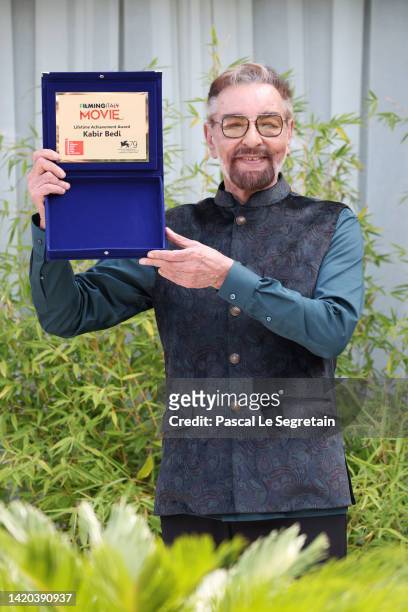 Kabir Bedi poses with the Filming Italy Lifetime Achievement Award at the Hotel Excelsior during the 79th Venice International Film Festival on...