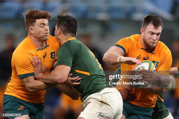 Jed Holloway of the Wallabies is tackled during The Rugby Championship match between the Australia Wallabies and South Africa Springboks at Allianz...