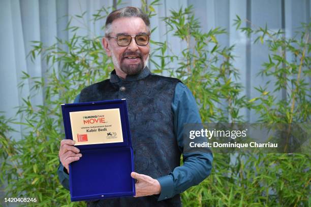 Kabir Bedi poses with the Filming Italy Lifetime Achievement Award at the Hotel Excelsior during the 79th Venice International Film Festival on...