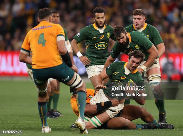 Eben Etzebeth of the Springboks is tackled during The Rugby Championship match between the Australia Wallabies and South Africa Springboks at Allianz...