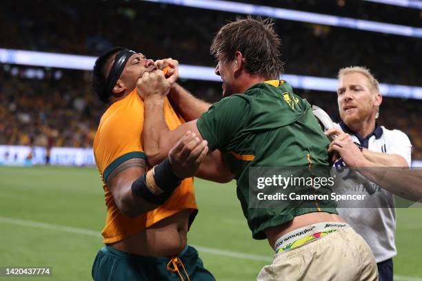 Eben Etzebeth of the Springboks has a disagreement with Allan Alaalatoa of the Wallabies during The Rugby Championship match between the Australia...