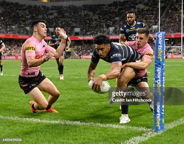 Murray Taulagi of the Cowboys attempts to score a try during the round 25 NRL match between the North Queensland Cowboys and the Penrith Panthers at...