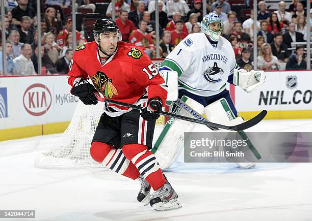 Andrew Brunette of the Chicago Blackhawks skates in front of goalie Roberto Luongo of the Vancouver Canucks during the NHL game on March 21, 2012 at...