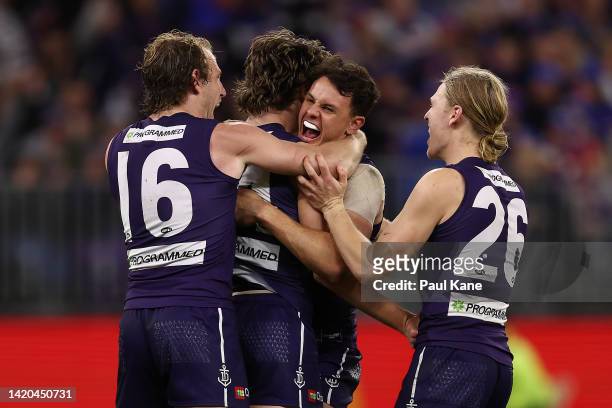 Jye Amiss of the Dockers celebrates a goal with David Mundy, Heath Chapman and Hayden Young during the AFL First Elimination Final match between the...