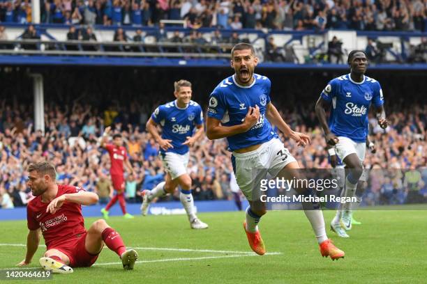 Conor Coady of Everton celebrates after scoring a goal which was later disallowed for offside by VAR during the Premier League match between Everton...