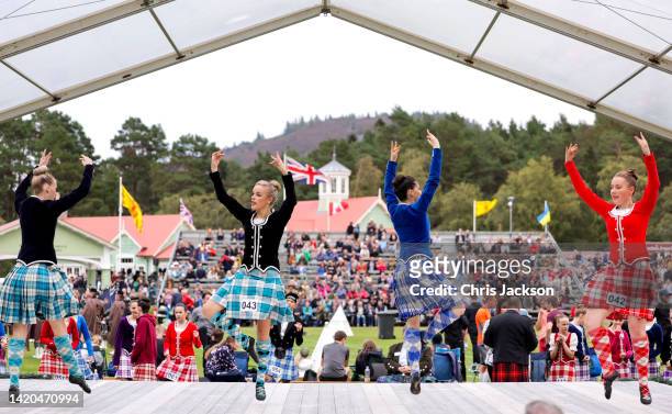 Competitors in the Highland Fling Scottish Highland dance competition perform during the Braemar Highland Gathering at the Princess Royal & Duke of...