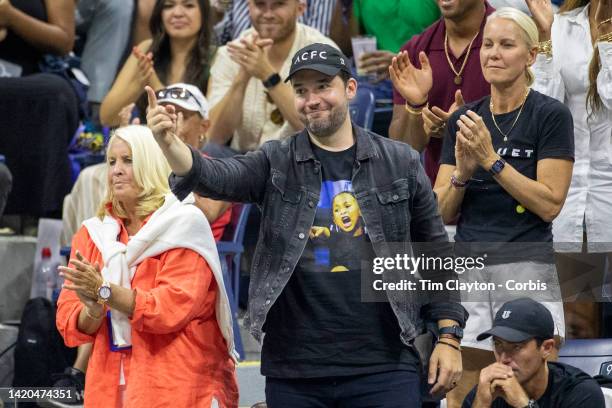 September 02: Alexis Ohanian, husband of Serena Williams of the United States cheers her on from the team box while wearing a t-shirt showing their...