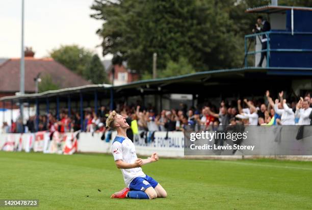 Connor Comber of Bury AFC celebrates after scoring their side's second goal during the The Emirates FA Cup First Round Qualifying match between Bury...