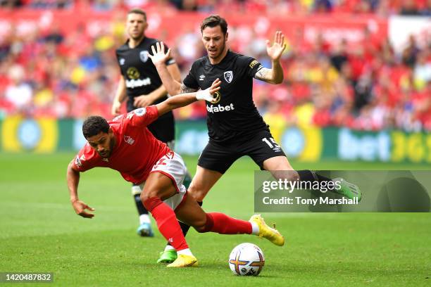 Renan Lodi of Nottingham Forest is challenged by Adam Smith of AFC Bournemouth during the Premier League match between Nottingham Forest and AFC...