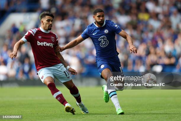 Lucas Paqueta of West Ham United is challenged by Ruben Loftus-Cheek of Chelsea during the Premier League match between Chelsea FC and West Ham...