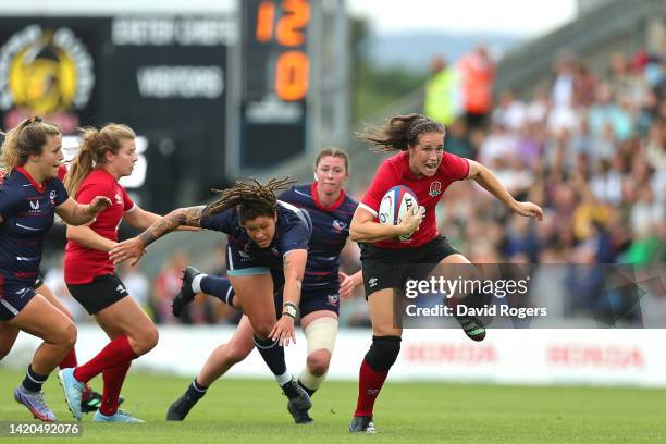 Emily Scarratt of England breaks away with the ball during the Women's International rugby match between England Red Roses and United States at Sandy...