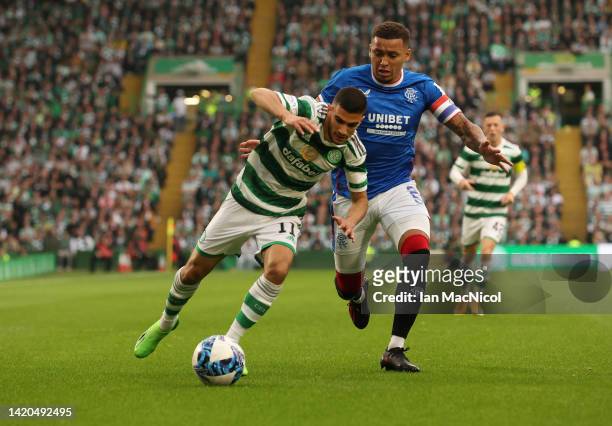 Liel Abada of Celtic vies with James Tavernier of Rangers during the Cinch Scottish Premiership match between Celtic FC and Rangers FC at on...