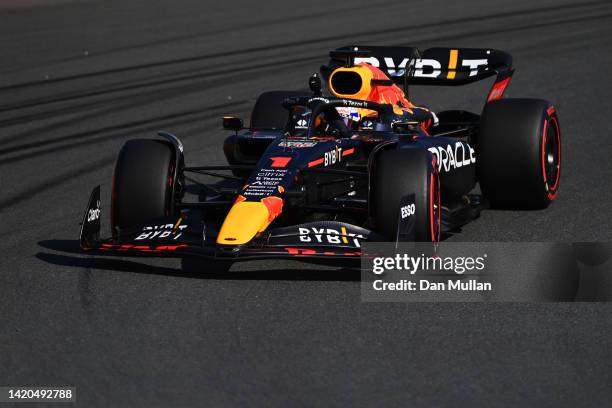 Pole position qualifier Max Verstappen of the Netherlands driving the Oracle Red Bull Racing RB18 waves to the crowd during qualifying ahead of the...